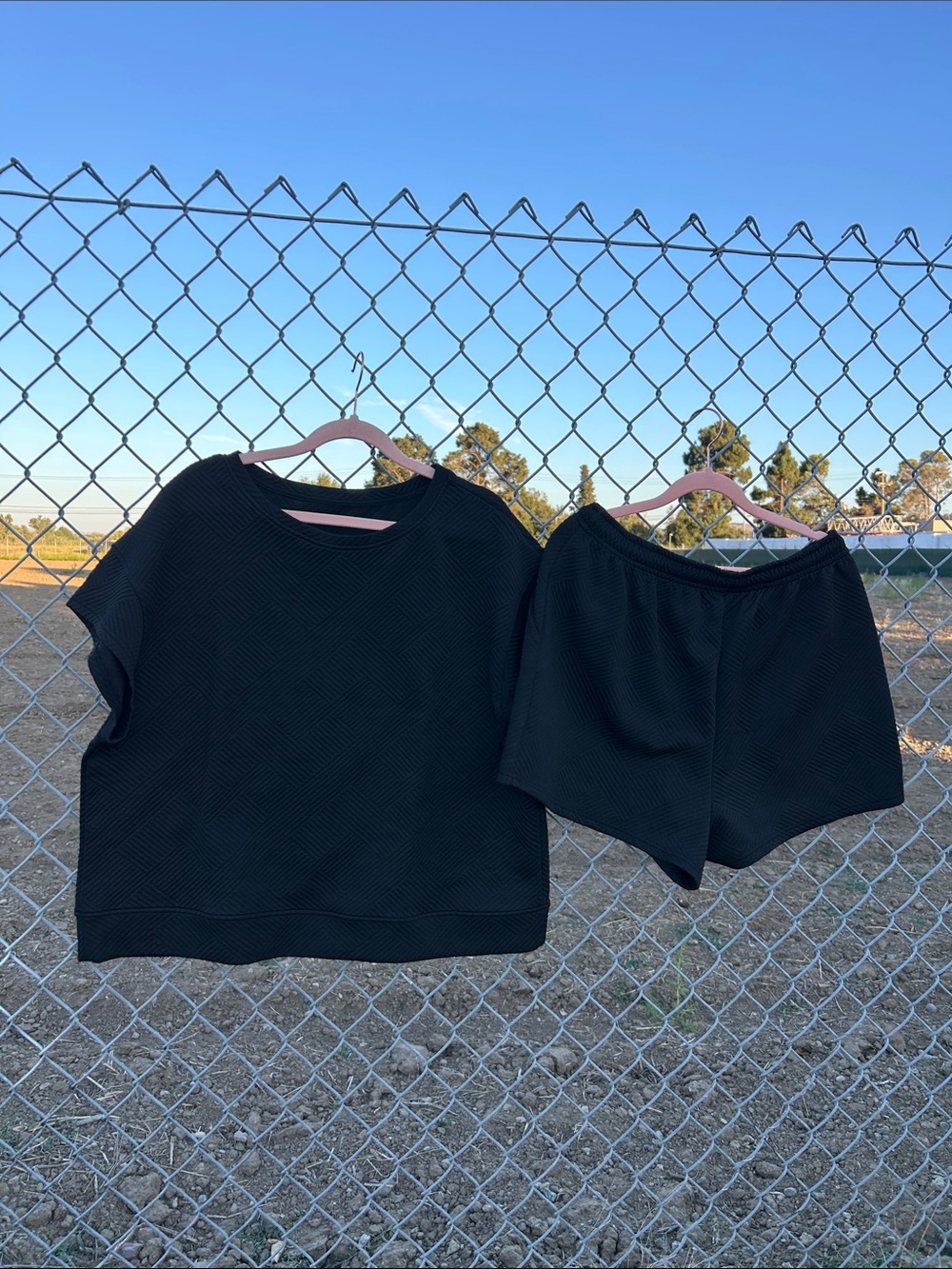 Sporty and Casual Black Textured Short Sleeve Top & Shorts Set